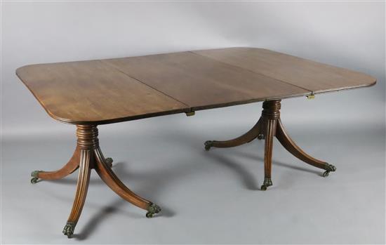 A Regency mahogany twin pillar extending dining table, extends to 6ft 2in. x 4ft 5in. H.2ft 4in.
